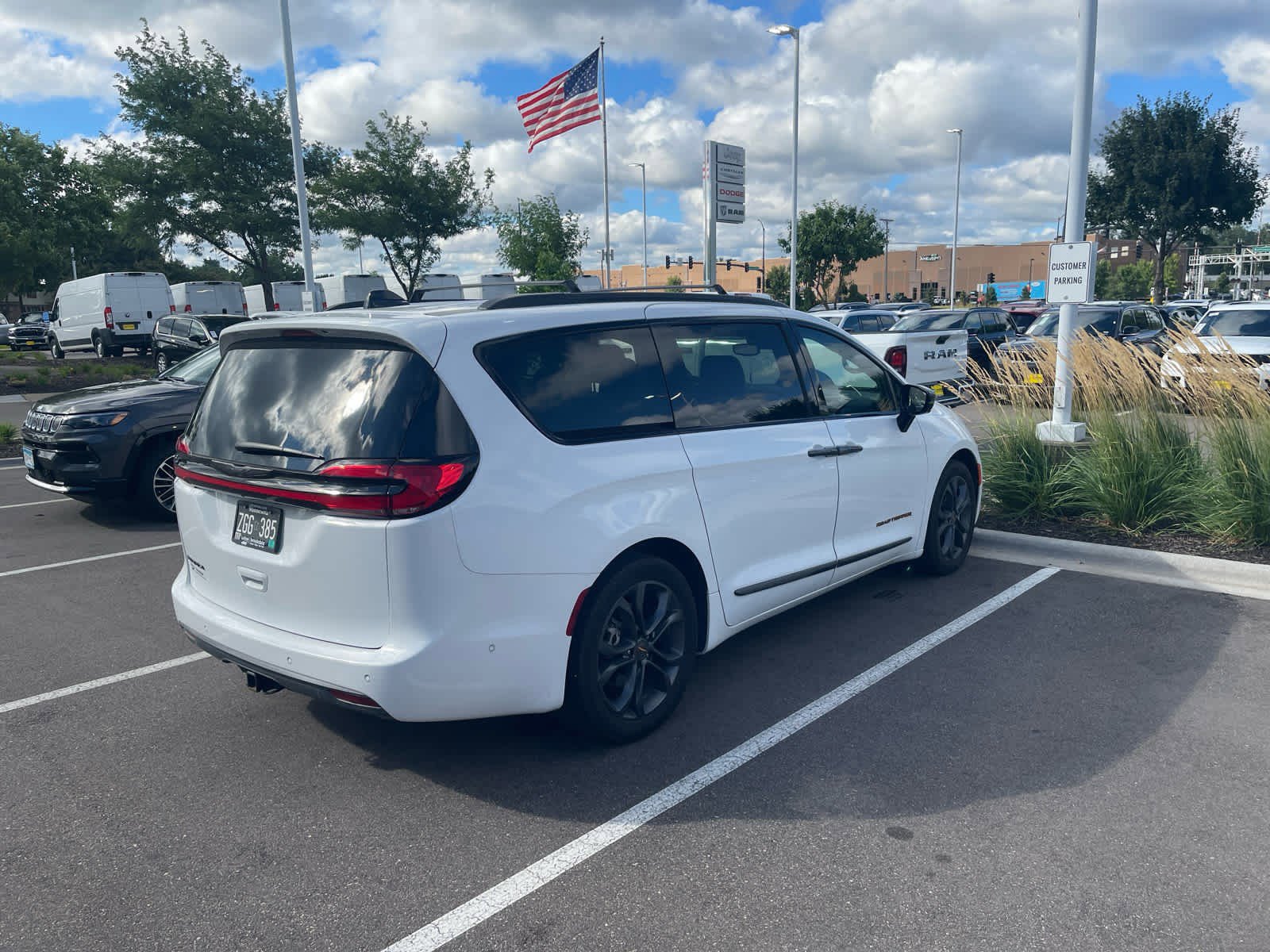 Certified 2024 Chrysler Pacifica Touring L with VIN 2C4RC1BGXRR102374 for sale in Brooklyn Park, Minnesota