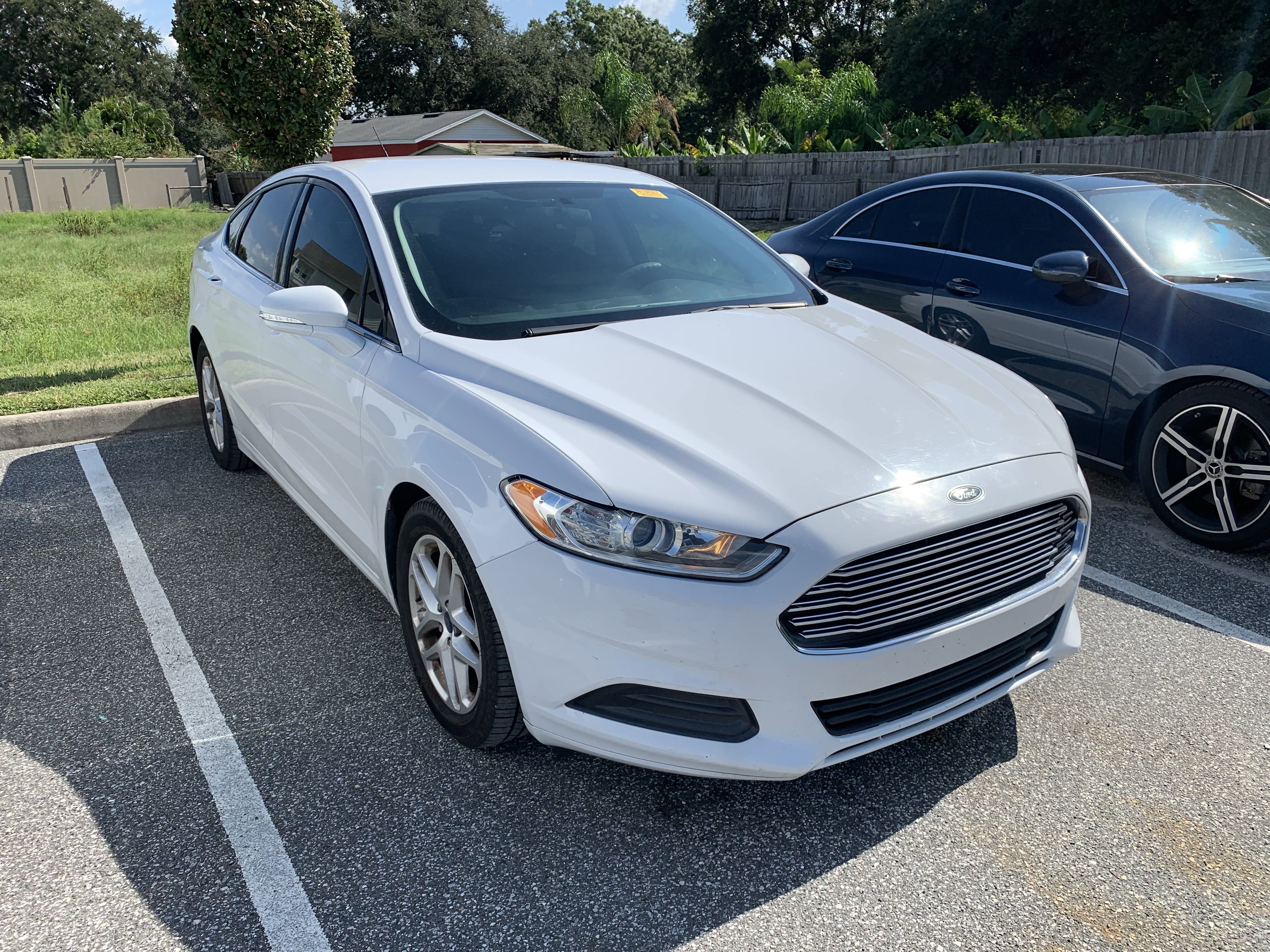 Used 2015 Ford Fusion SE with VIN 3FA6P0H70FR115607 for sale in Winter Haven, FL