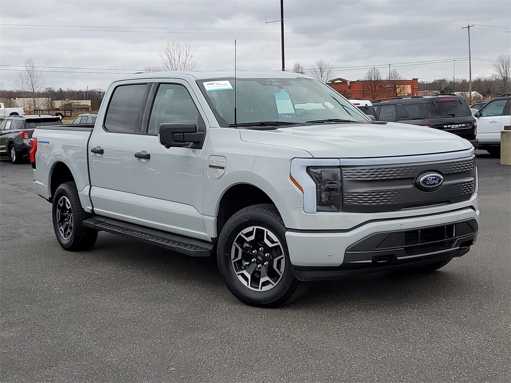 Certified 2023 Ford F-150 Lightning XLT with VIN 1FTVW1ELXPWG26563 for sale in Saint Johns, MI