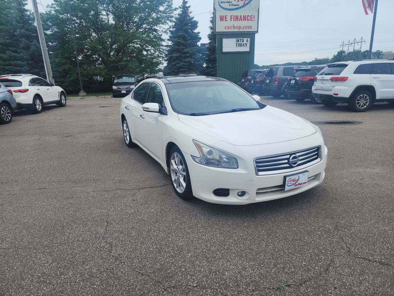 Used 2012 White Nissan S image 1