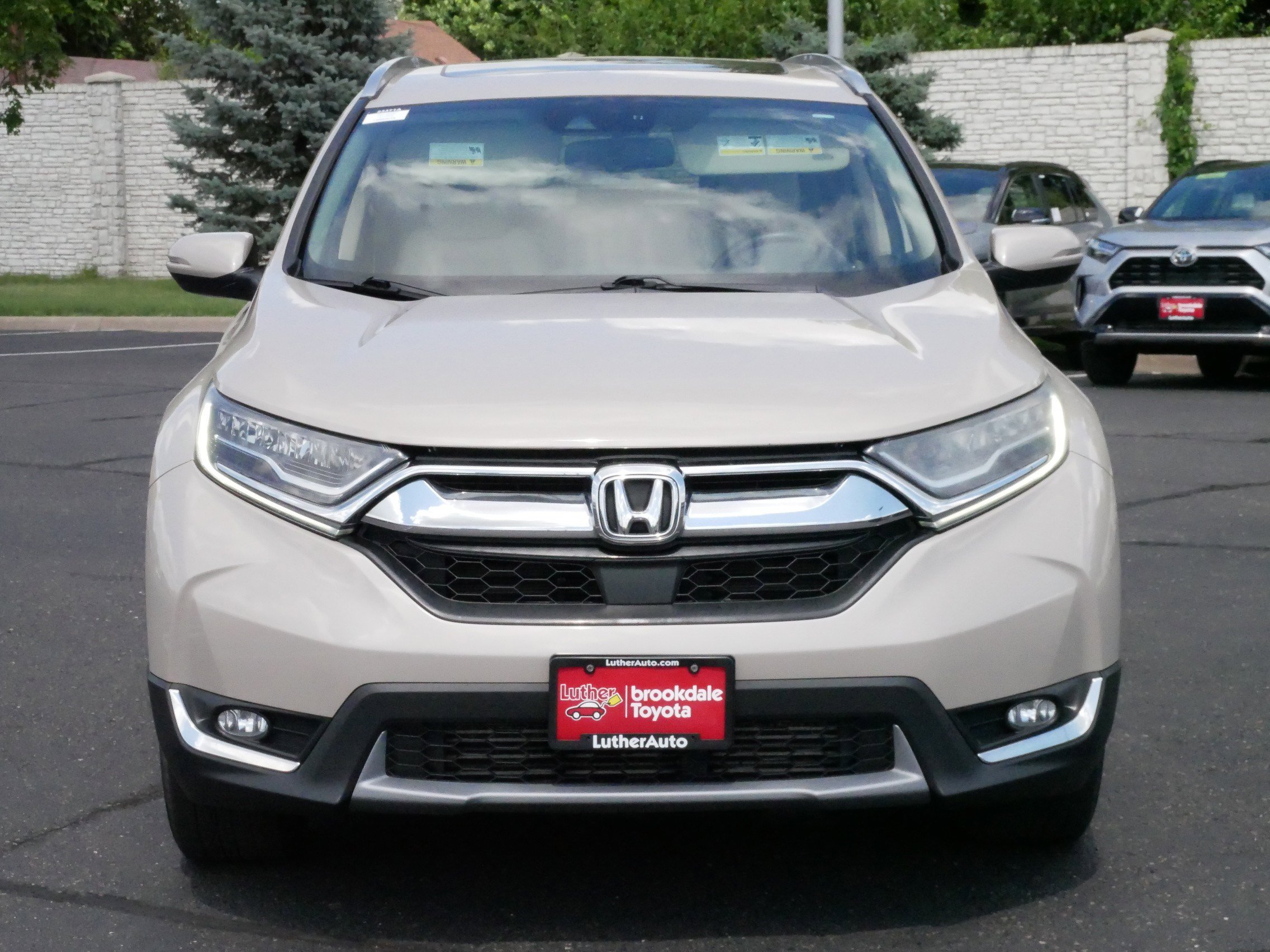 Used 2017 Honda CR-V Touring with VIN 5J6RW2H94HL038596 for sale in Brooklyn Center, Minnesota