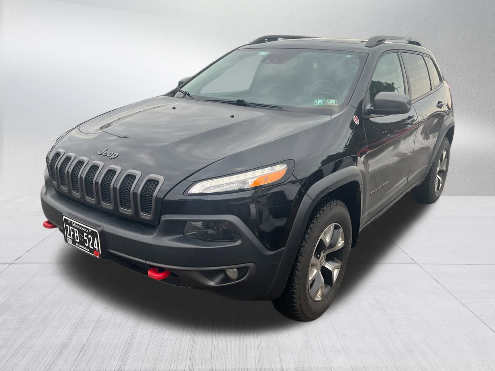 Used 2014 Jeep Cherokee Trailhawk with VIN 1C4PJMBS3EW215863 for sale in Brooklyn Center, Minnesota