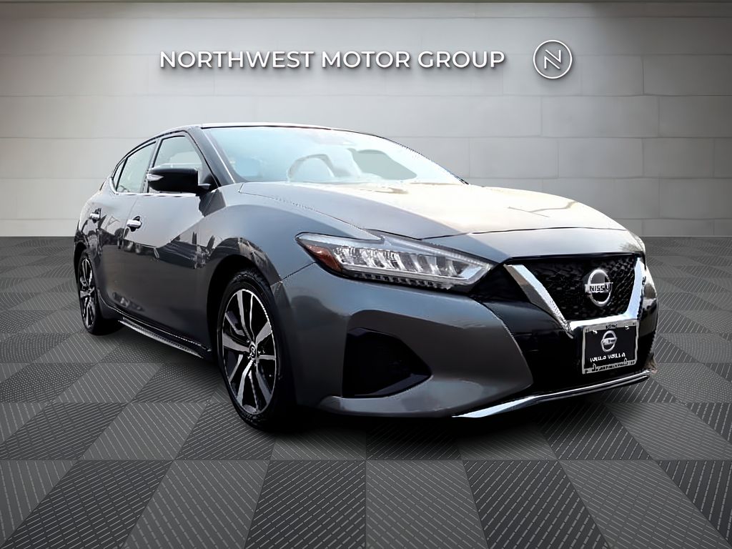 Used 2021 Gun Metallic Nissan SV image 1