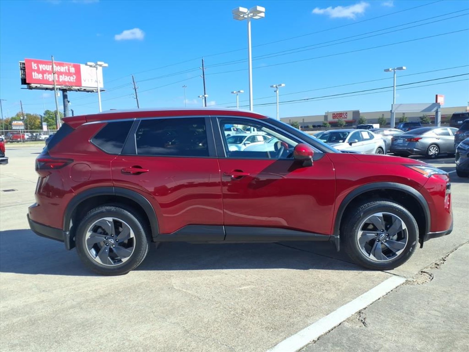 2024 Nissan Rogue SV Red at Robbins Nissan
