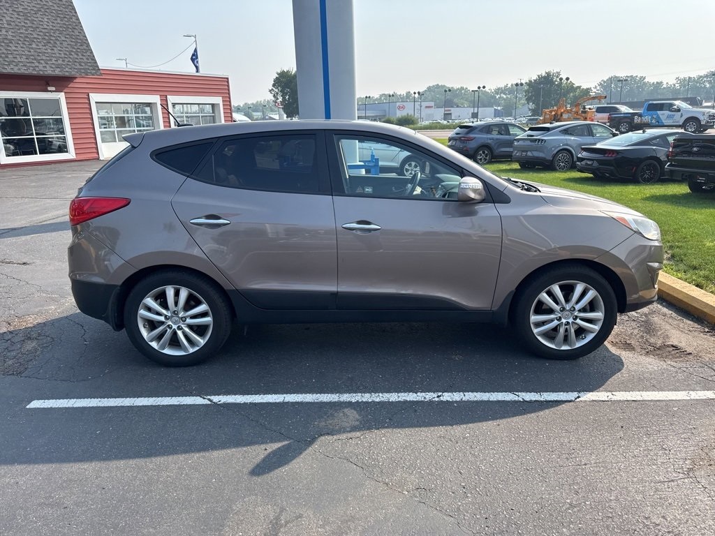 Used 2012 Hyundai Tucson Limited with VIN KM8JUCACXCU319983 for sale in White Bear Lake, Minnesota