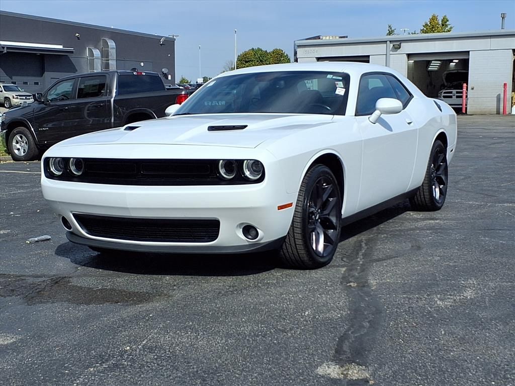 Used 2021 Dodge Challenger SXT with VIN 2C3CDZAG4MH573703 for sale in Kansas City