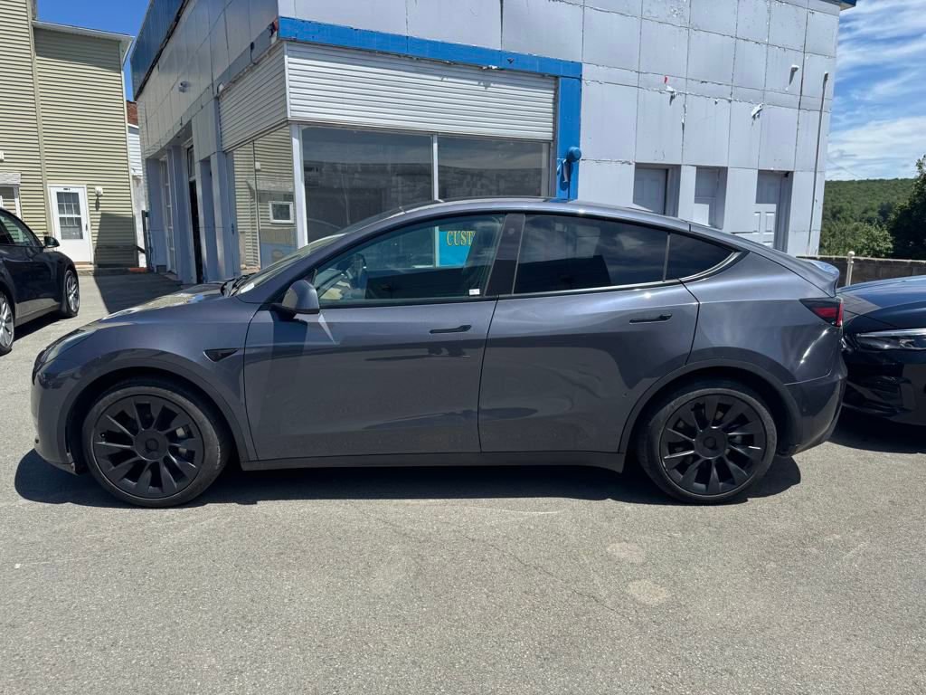 Used 2022 Tesla Model Y Long Range with VIN 7SAYGDEE2NF306929 for sale in Forest City, PA