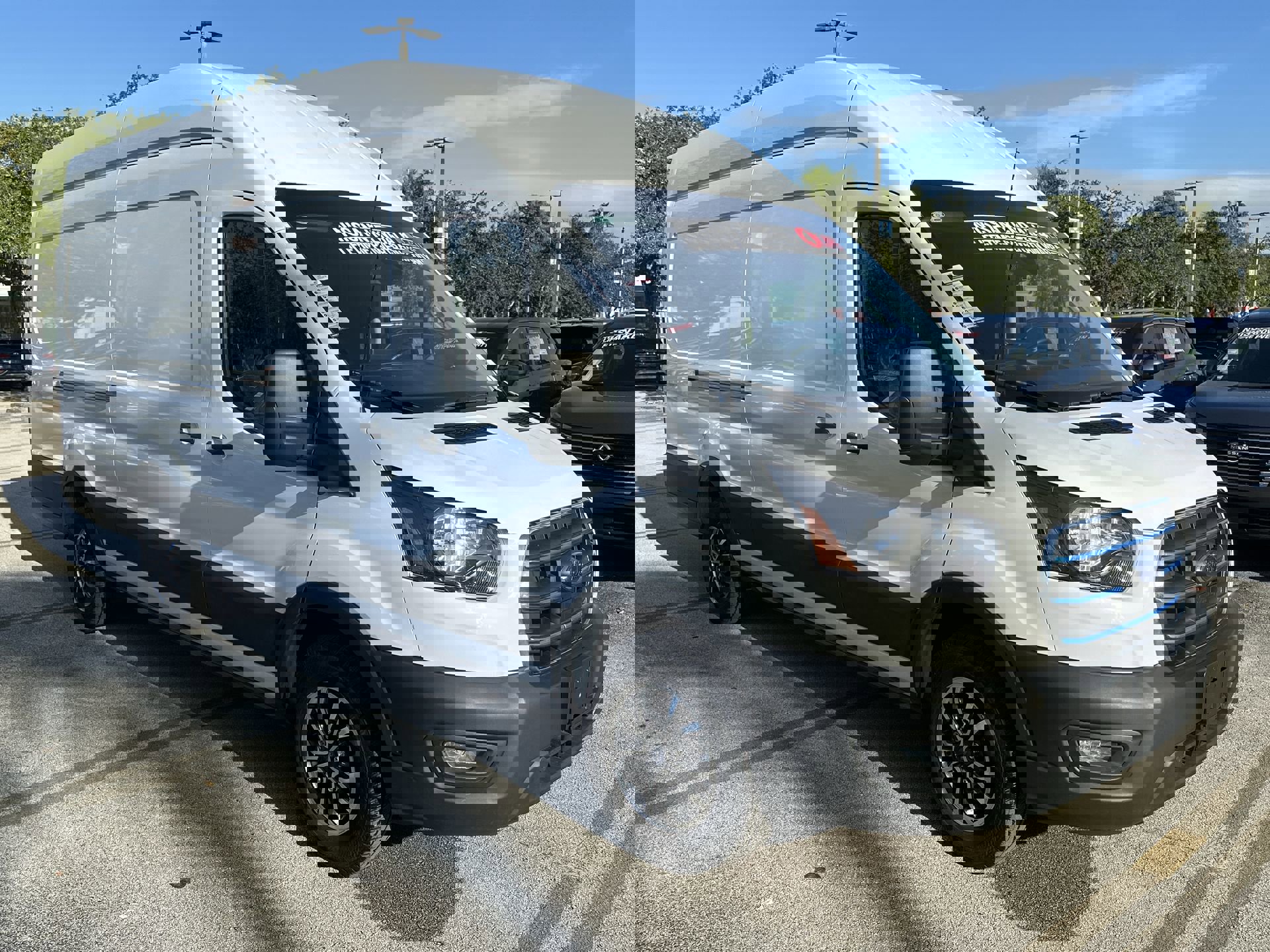 Used 2023 Ford E-Transit Cargo Van Base with VIN 1FTBW3XK4PKB55987 for sale in Palmetto Bay, FL