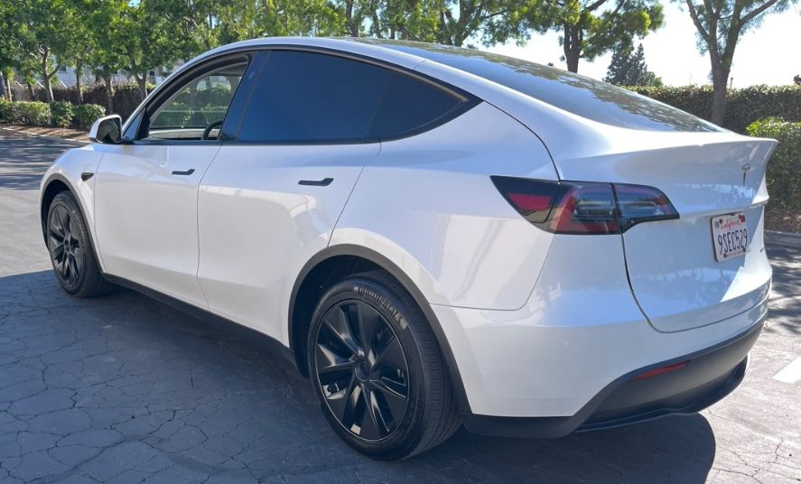 Used 2025 Tesla Model Y Long Range with VIN 7SAYGAEE3SF291674 for sale in Northfield, Minnesota