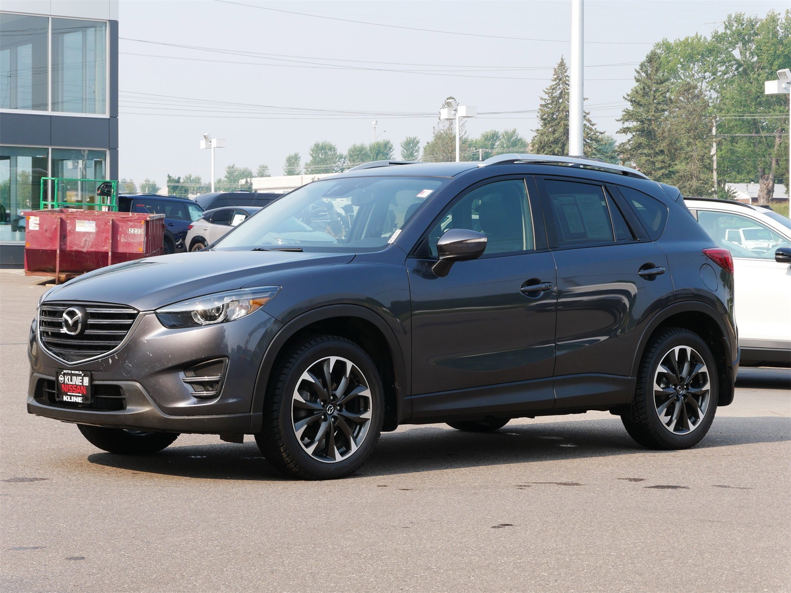 Used 2016 Mazda CX-5 Grand Touring with VIN JM3KE4DY0G0609897 for sale in Maplewood, Minnesota