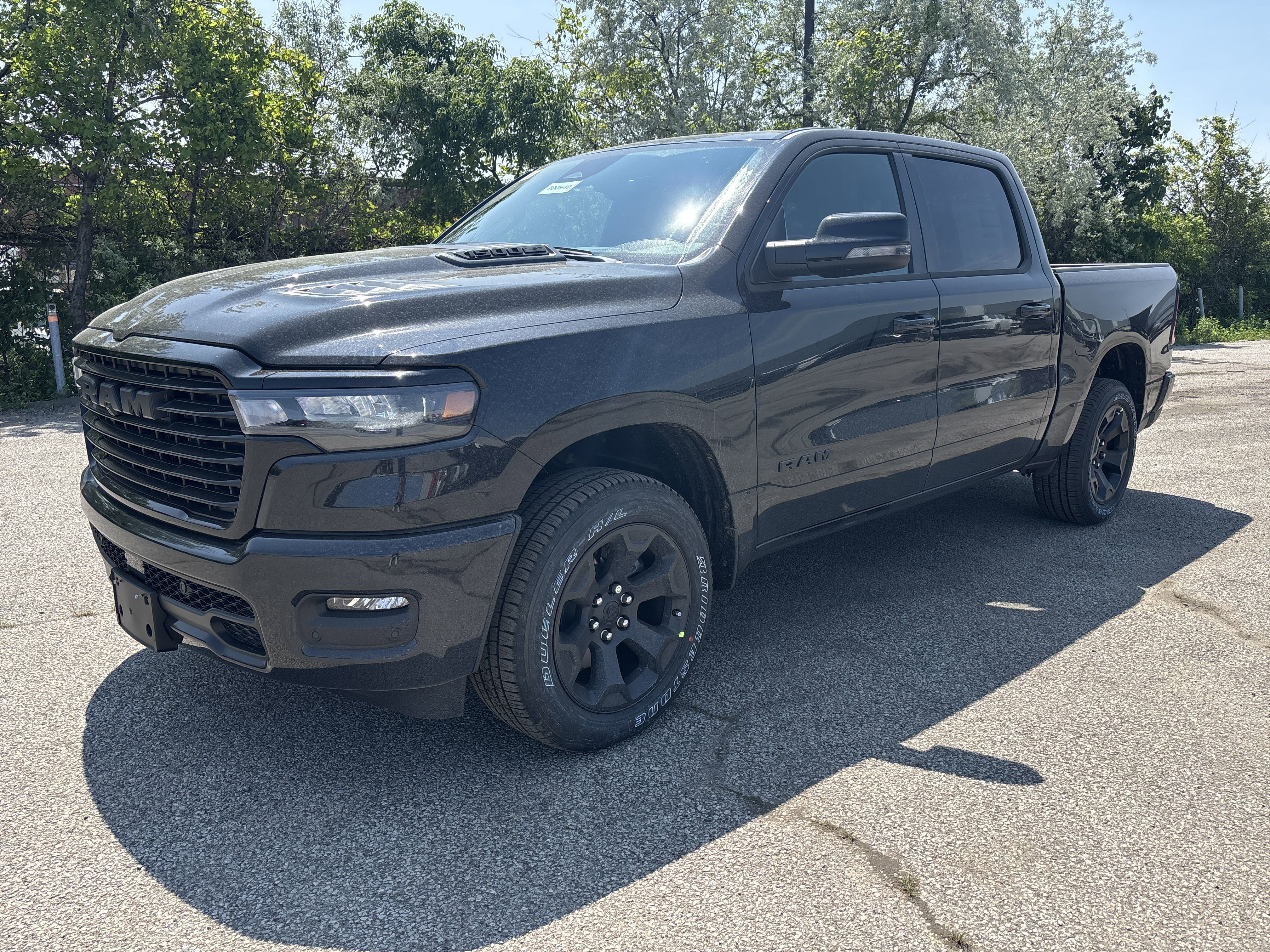 New 2025 Diamond Black Crystal Pearlcoat Ram Sport image 1