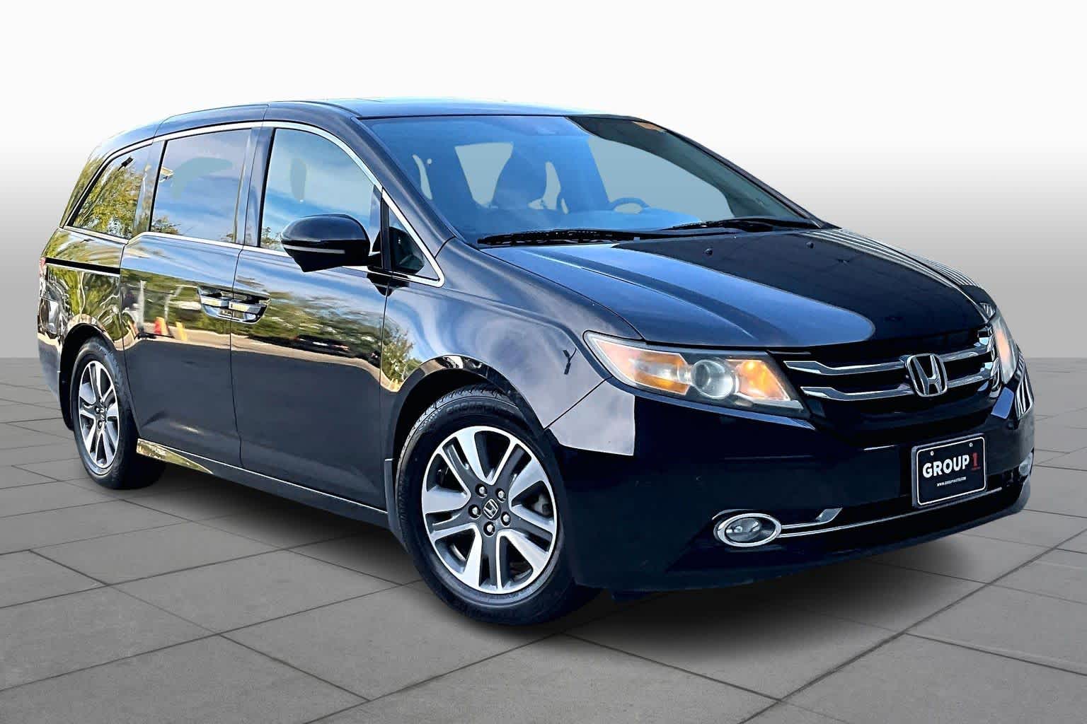 Used 2016 Honda Odyssey Touring with VIN 5FNRL5H9XGB018385 for sale in Stafford, TX