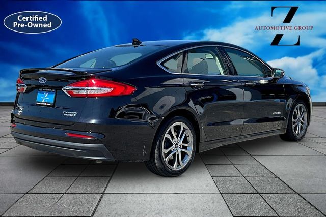 Used 2019 Ford Fusion Hybrid Titanium with VIN 3FA6P0RU4KR180684 for sale in Camilla, GA
