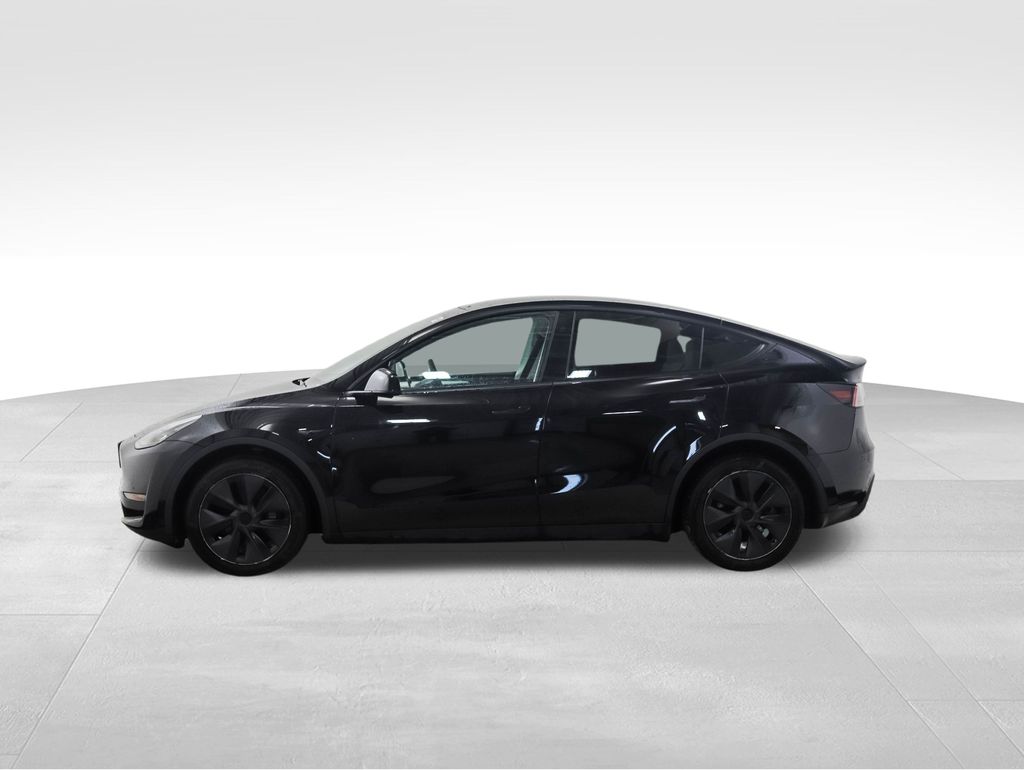 Used 2024 Tesla Model Y Long Range with VIN 7SAYGDEE9RF156792 for sale in Minneapolis, Minnesota
