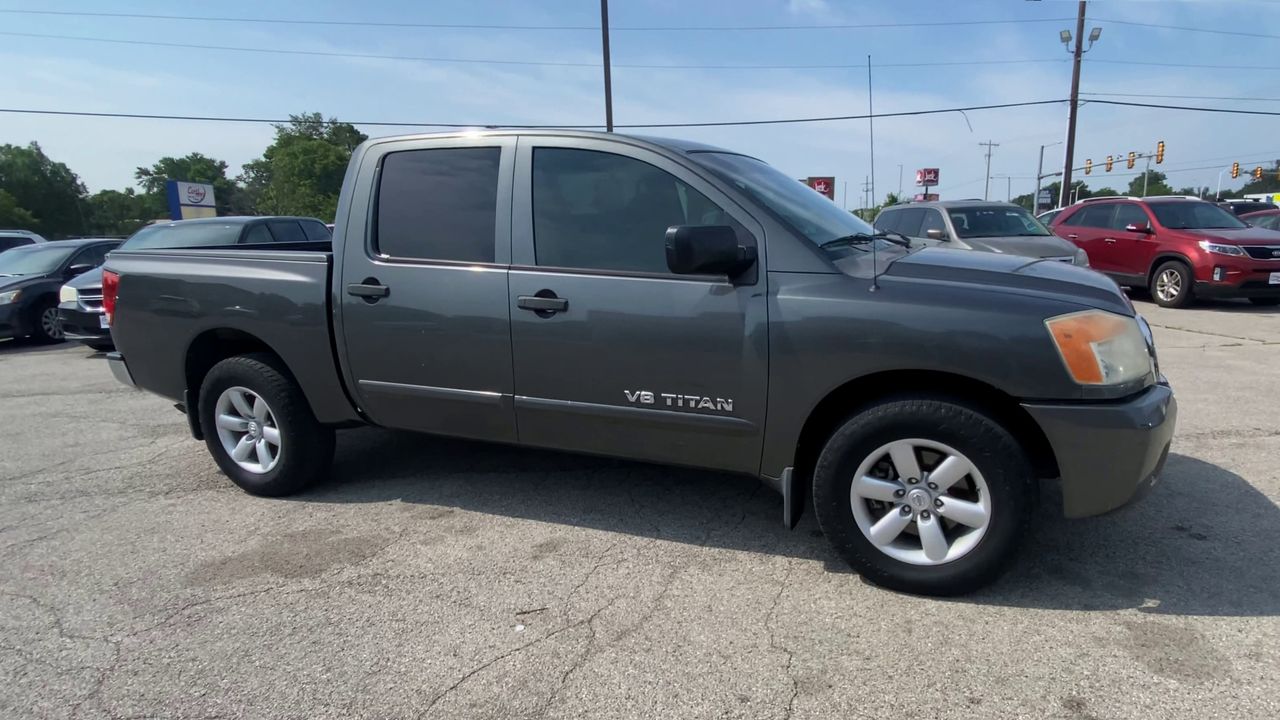 Used 2010 Gray Nissan LT image 1
