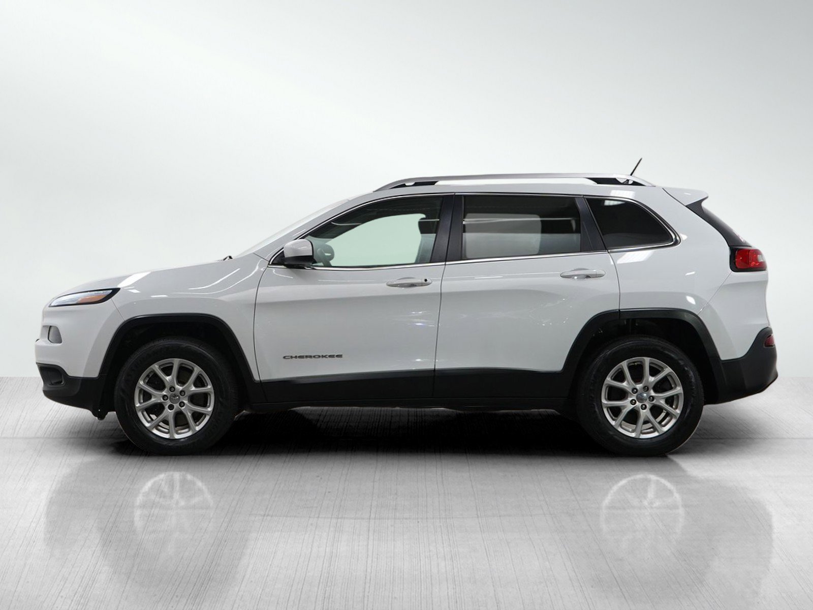 Used 2014 Jeep Cherokee Latitude with VIN 1C4PJMCS3EW297690 for sale in Hopkins, Minnesota