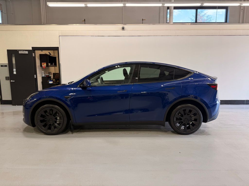 Used 2024 Tesla Model Y Long Range with VIN 7SAYGDEE9RA245677 for sale in Golden Valley, Minnesota