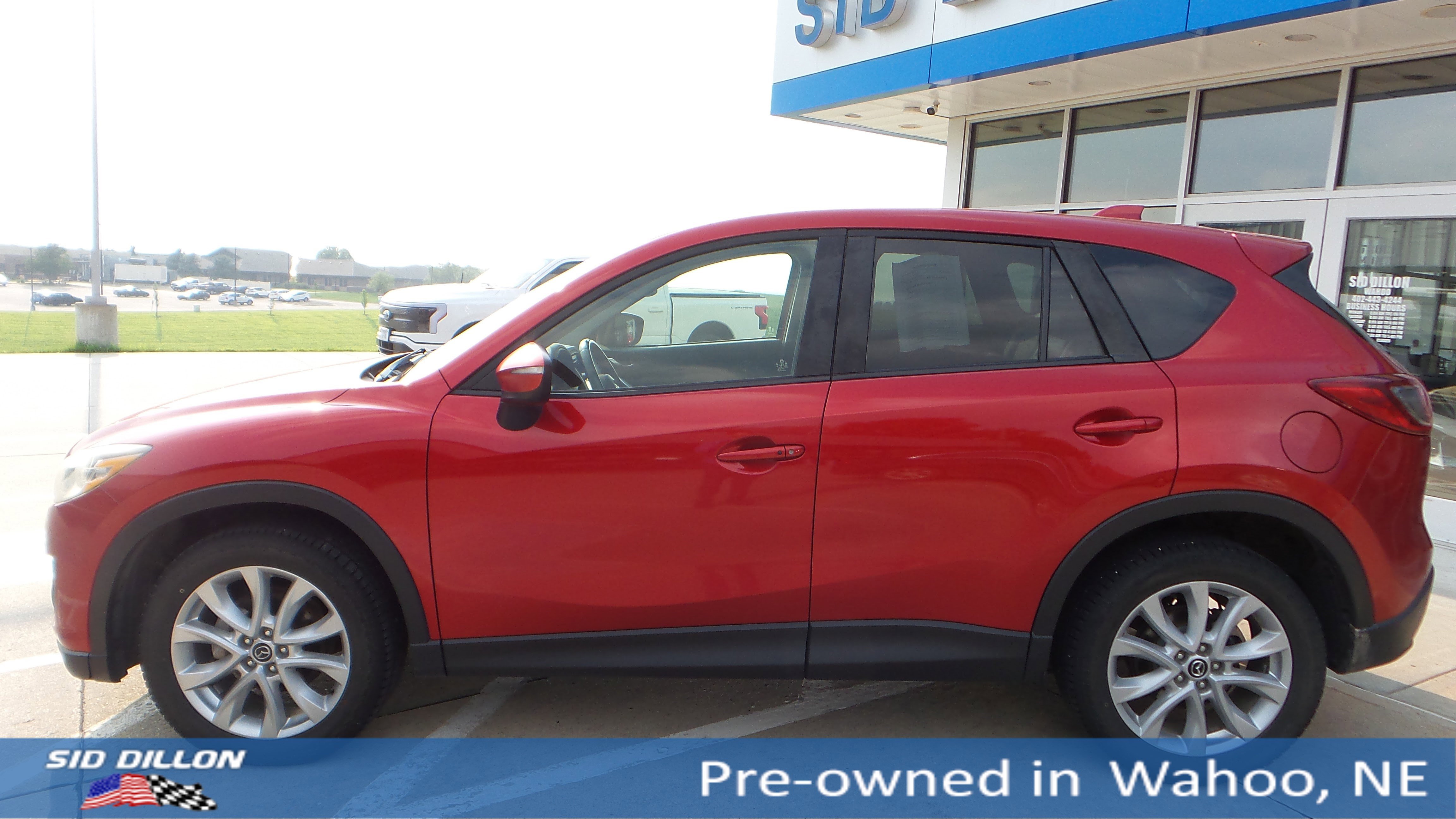 Used 2015 Mazda CX-5 Grand Touring with VIN JM3KE4DY9F0586984 for sale in Lincoln, NE