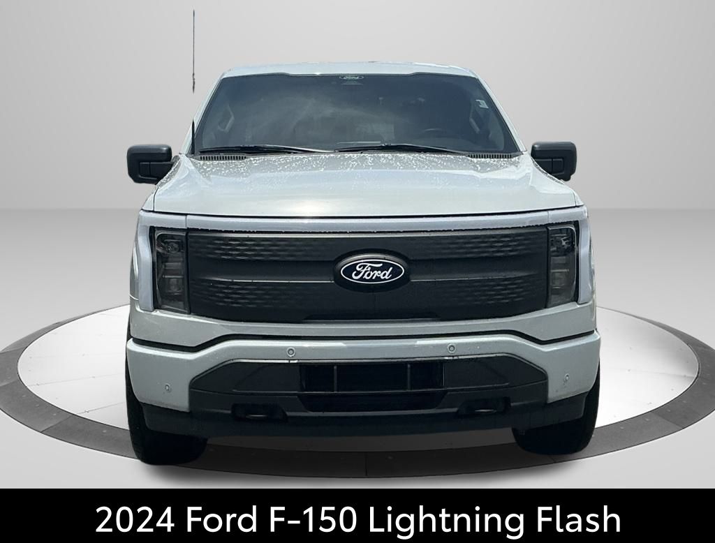 Used 2024 Ford F-150 Lightning Flash with VIN 1FT6W3L70RWG06895 for sale in Stuart, FL