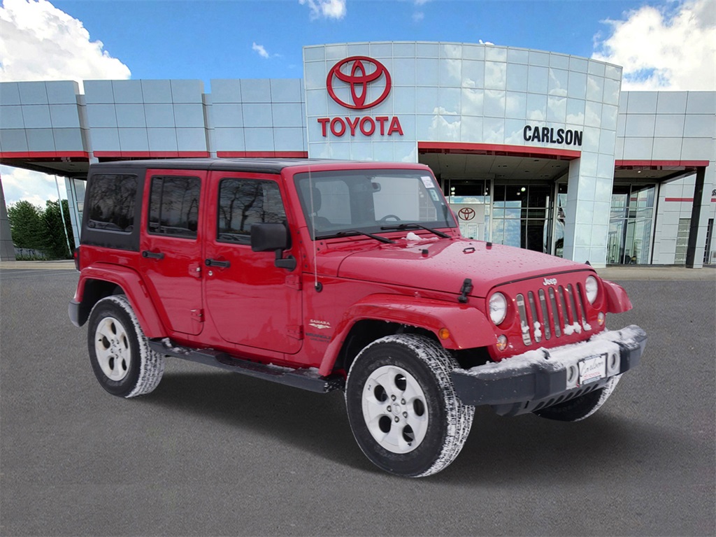 Used 2014 Jeep Wrangler Unlimited Sahara with VIN 1C4BJWEG1EL129465 for sale in Minneapolis, Minnesota