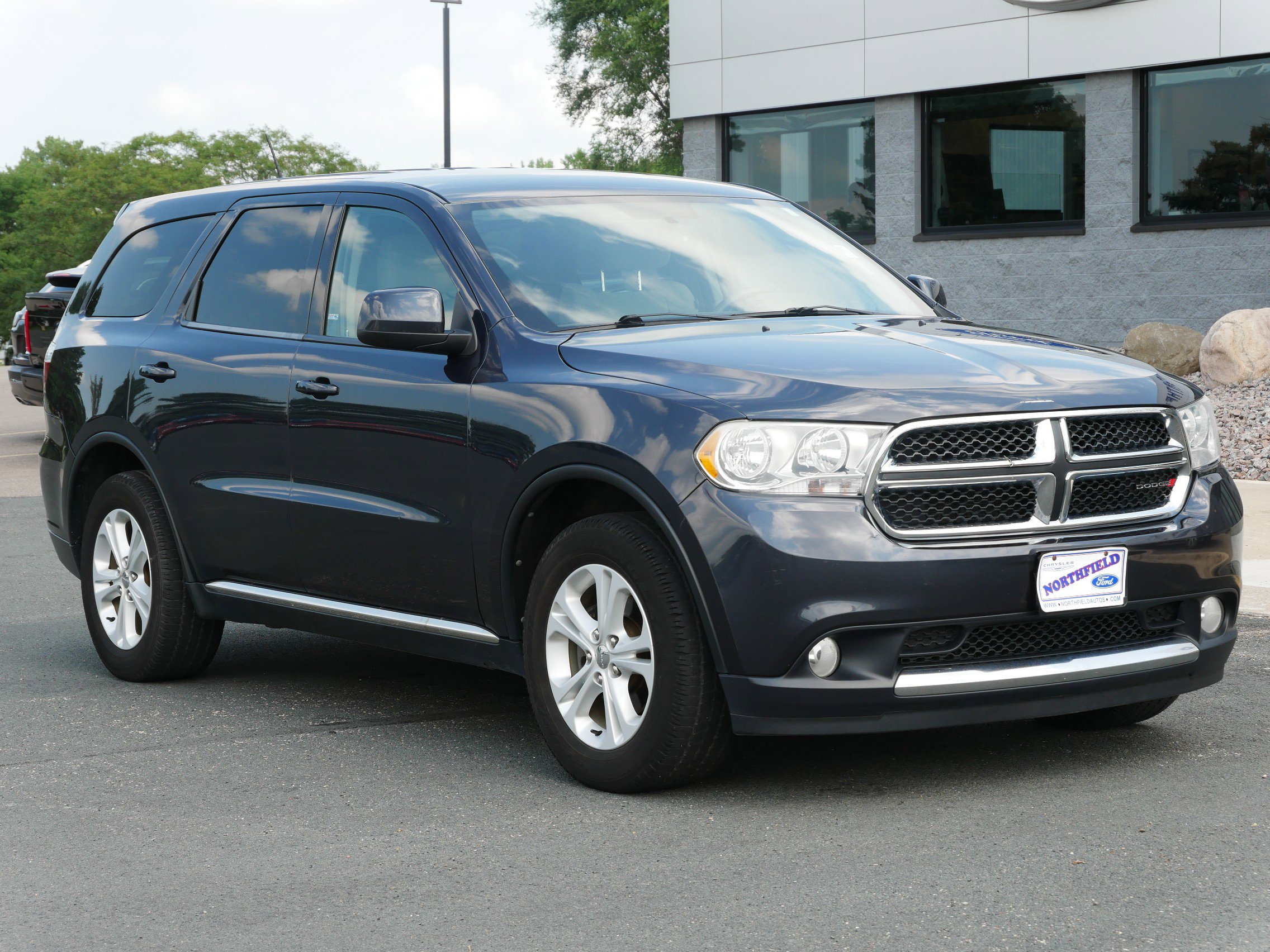 Used 2013 Dodge Durango SXT with VIN 1C4RDJAG4DC512555 for sale in Northfield, Minnesota