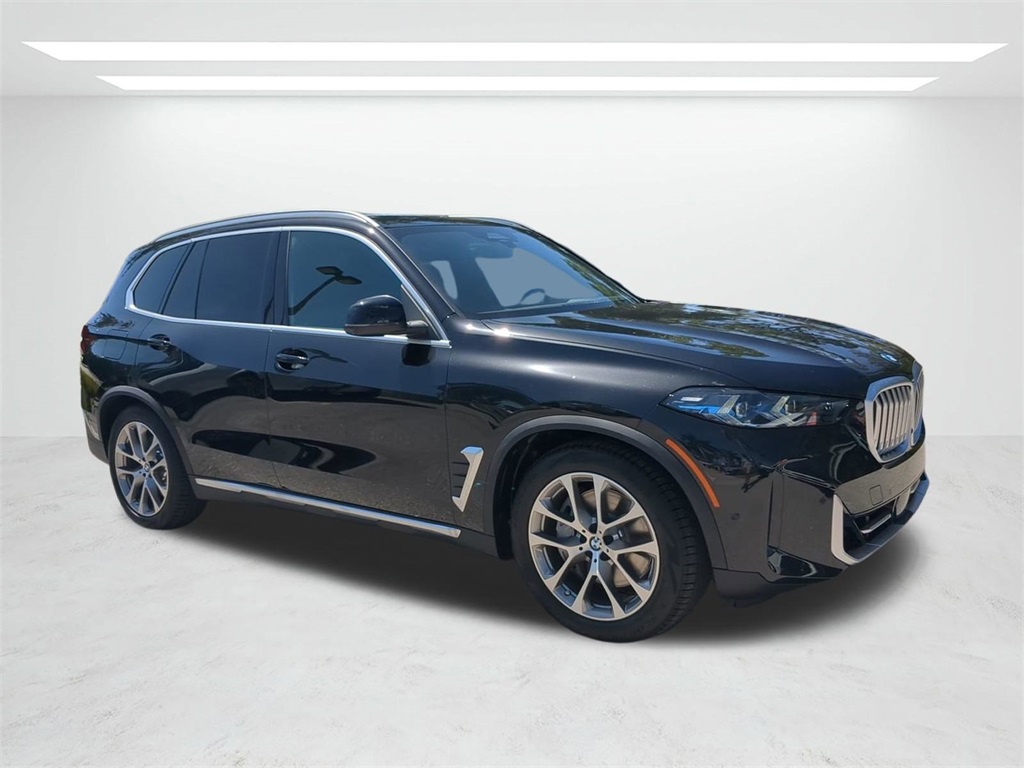 New 2026 Black Sapphire Metallic BMW xDrive50e image 2