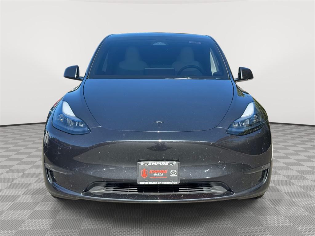 Used 2025 Tesla Model Y Long Range with VIN 7SAYGDED6SF231574 for sale in Kansas City