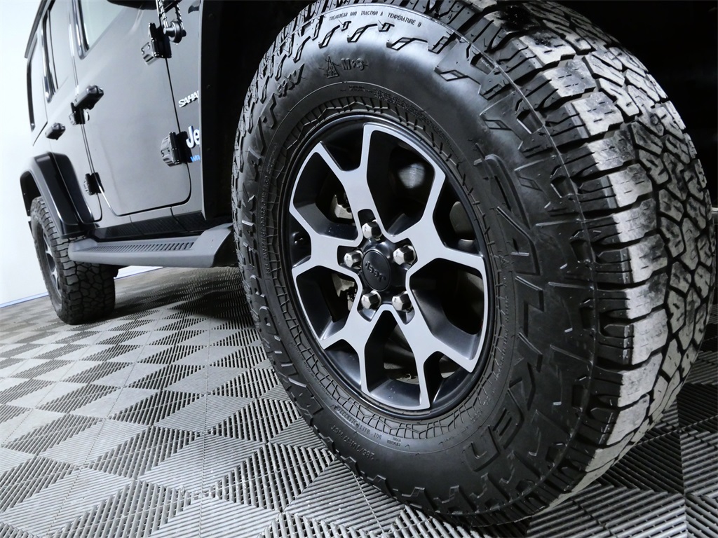 Used 2022 Jeep Wrangler Unlimited Sahara 4XE with VIN 1C4JJXP66NW277003 for sale in Apple Valley, Minnesota