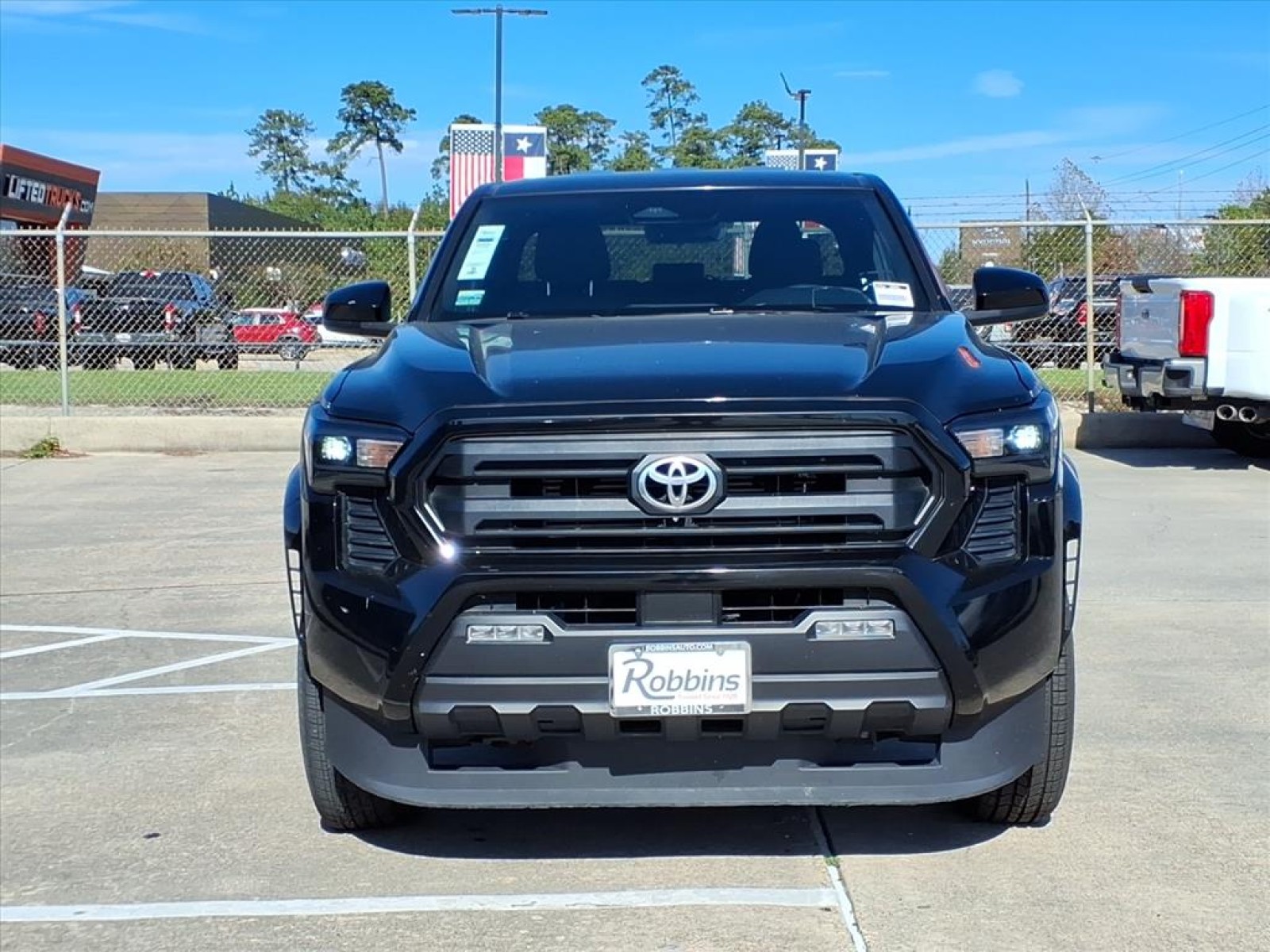 2024 Toyota Tacoma 4WD TRD Off Road Black at Robbins Nissan