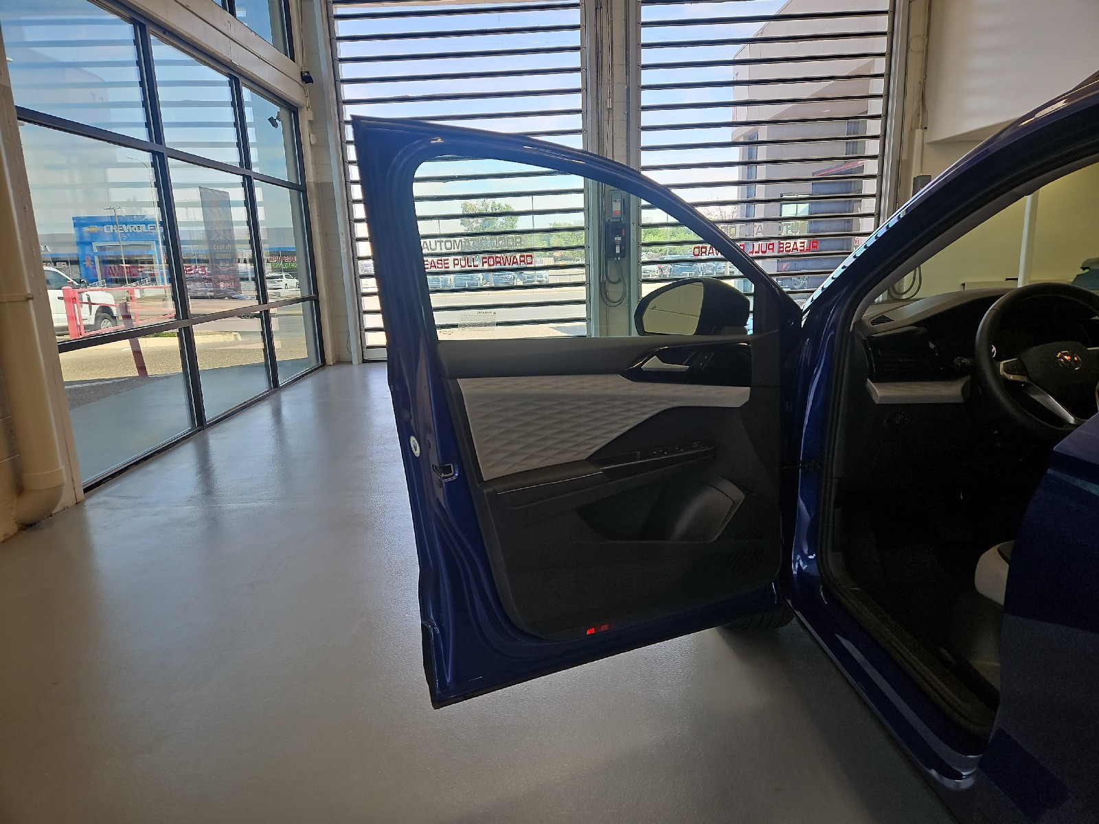 Used 2024 Dusk Blue Metallic Volkswagen S image 12