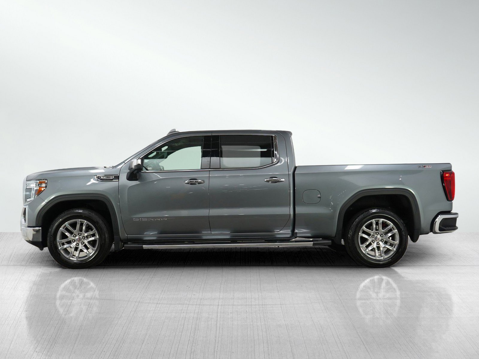Used 2021 GMC Sierra 1500 SLT with VIN 1GTU9DED2MZ208831 for sale in Roseville, Minnesota