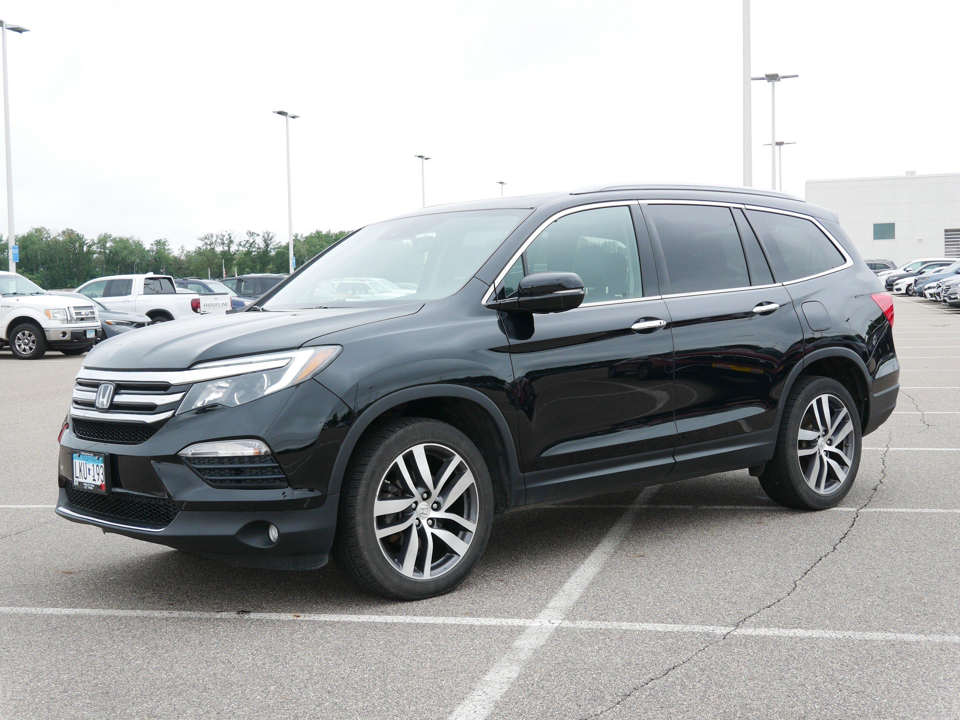 Used 2017 Honda Pilot Touring with VIN 5FNYF6H9XHB047105 for sale in Waite Park, Minnesota