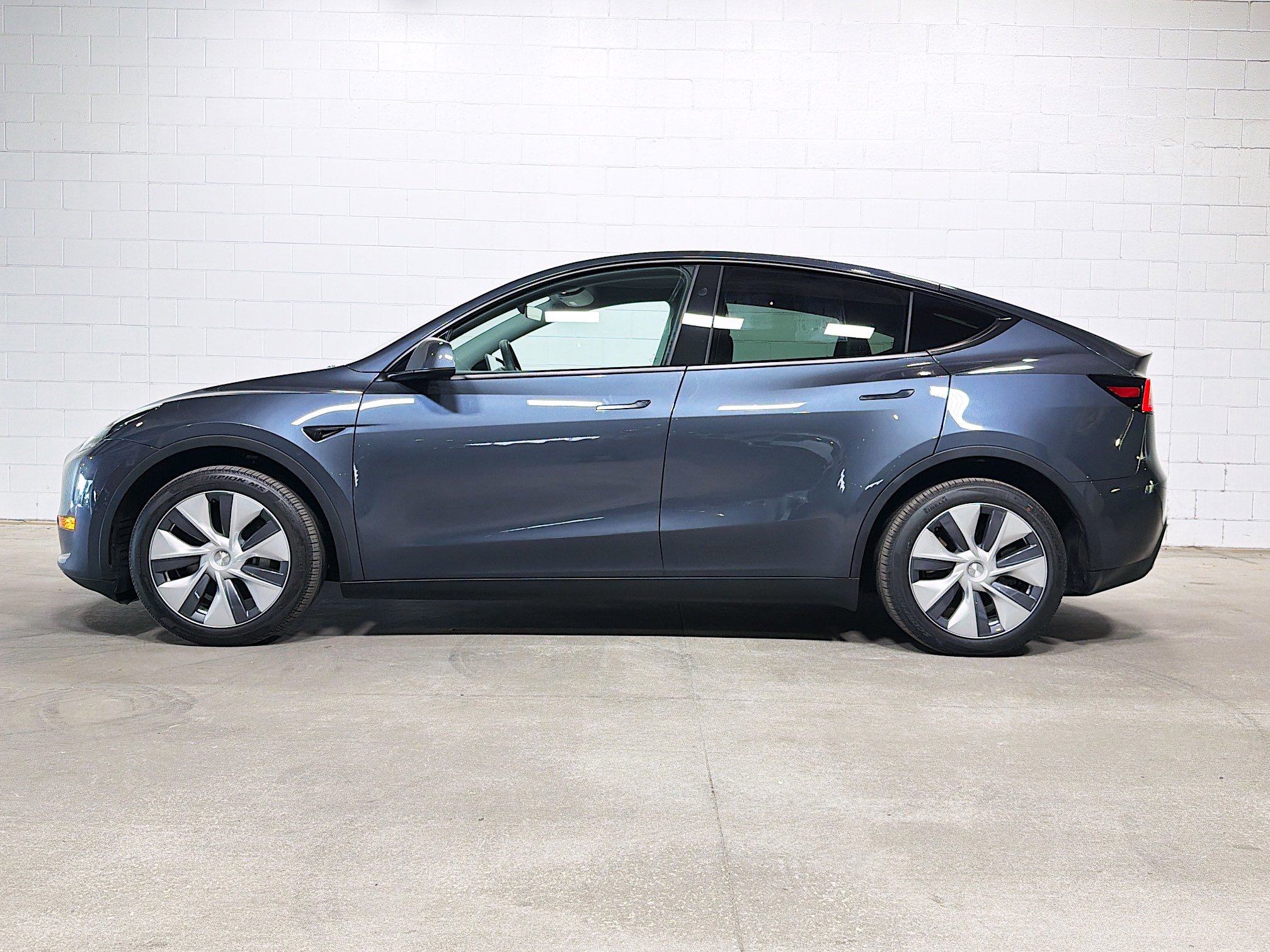 Used 2024 Tesla Model Y Long Range with VIN 7SAYGDEE7RA214931 for sale in Tampa, FL