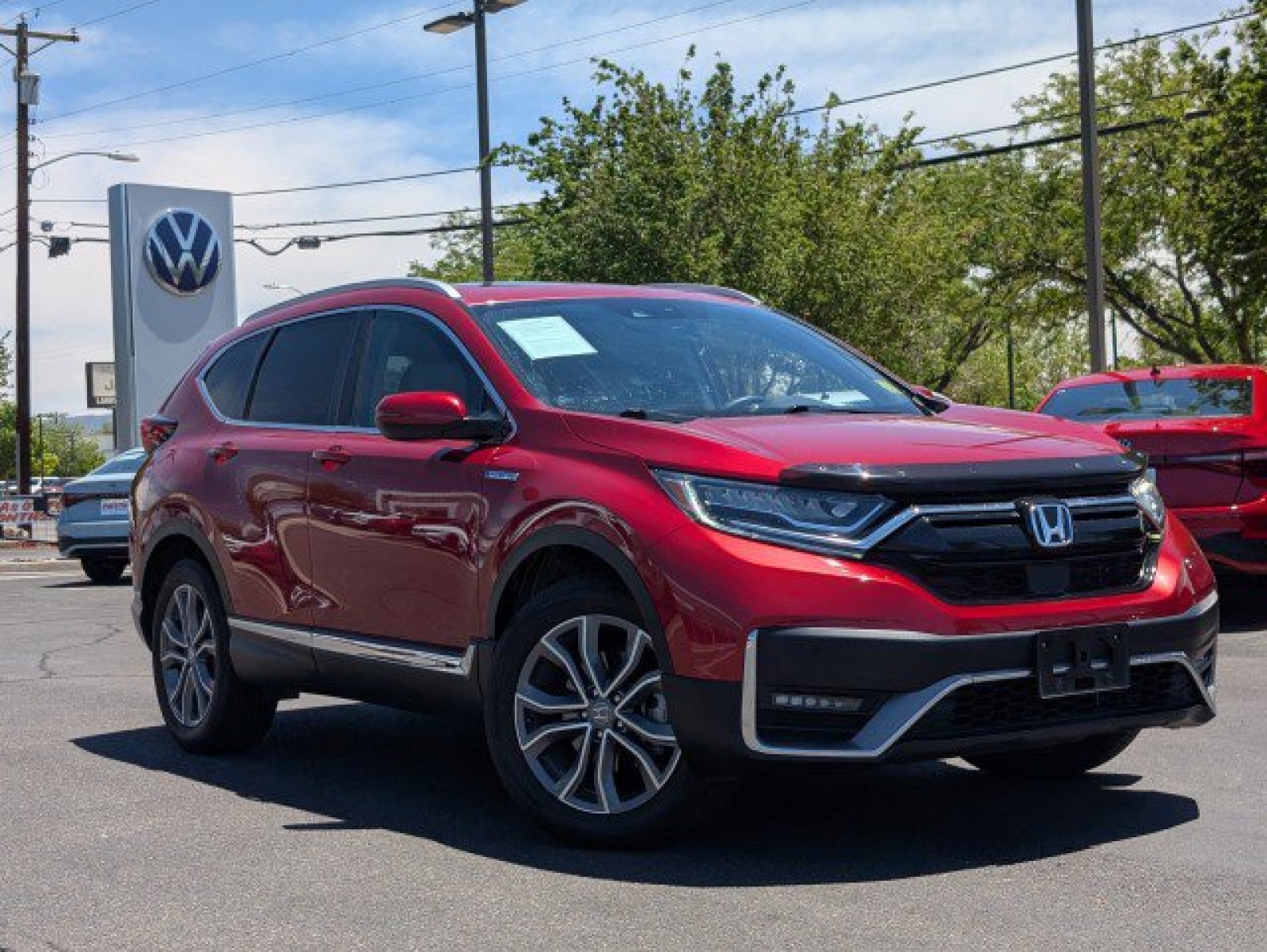 Used 2022 Radiant Red Metallic Honda Touring image 1