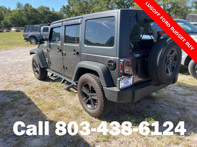 2014 Jeep Wrangler Unlimited Sport photo 2