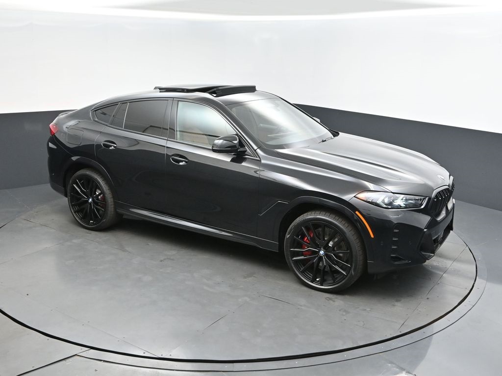 New 2026 Black Sapphire Metallic BMW M60i image 1