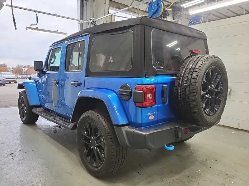 Used 2022 Jeep Wrangler Unlimited Sahara 4XE with VIN 1C4JJXP63NW279372 for sale in Kansas City