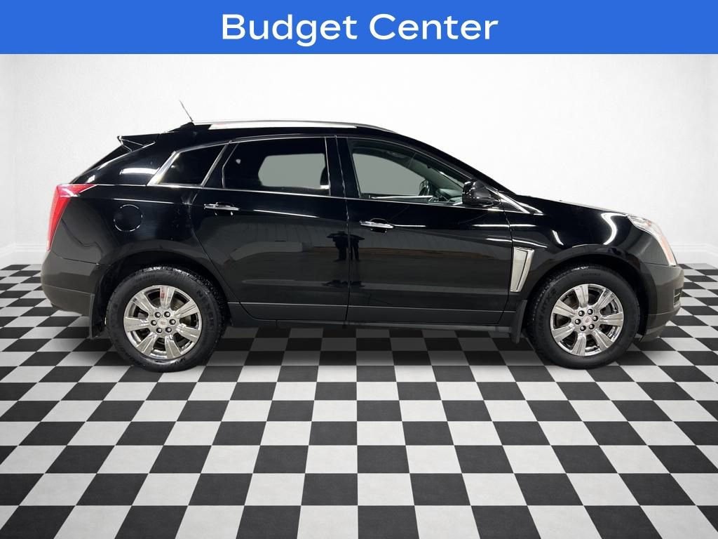 Used 2014 Cadillac SRX Luxury Collection with VIN 3GYFNEE35ES686851 for sale in Chippewa Falls, WI