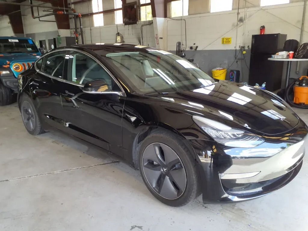 Used 2019 Tesla Model 3 Base with VIN 5YJ3E1EA0KF316752 for sale in Miami, FL