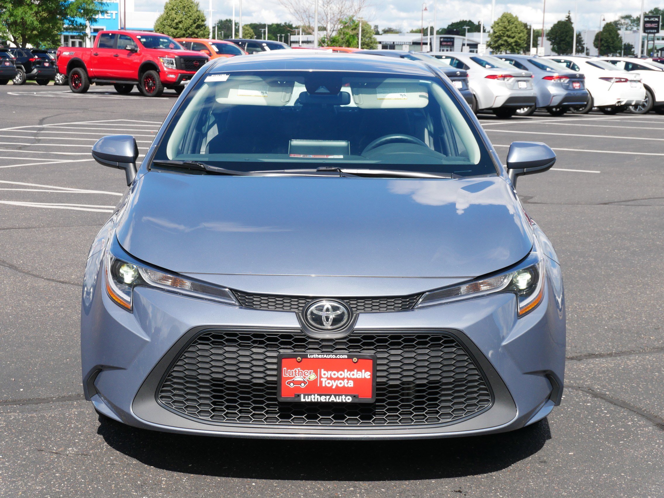 Certified 2021 Toyota Corolla LE with VIN 5YFEPMAE5MP245245 for sale in Brooklyn Center, Minnesota