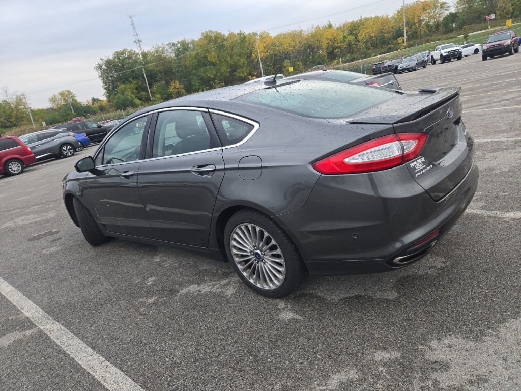 Used 2015 Ford Fusion Titanium with VIN 3FA6P0K98FR168663 for sale in Manhattan, KS