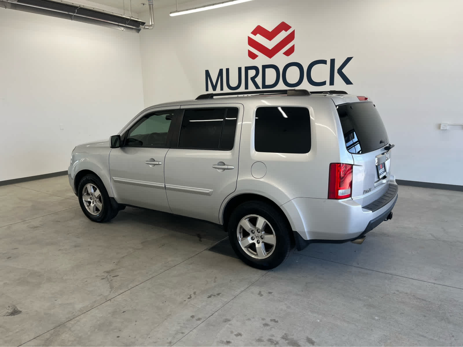 Used 2011 Honda Pilot EX-L with VIN 5FNYF4H56BB099582 for sale in Logan, UT
