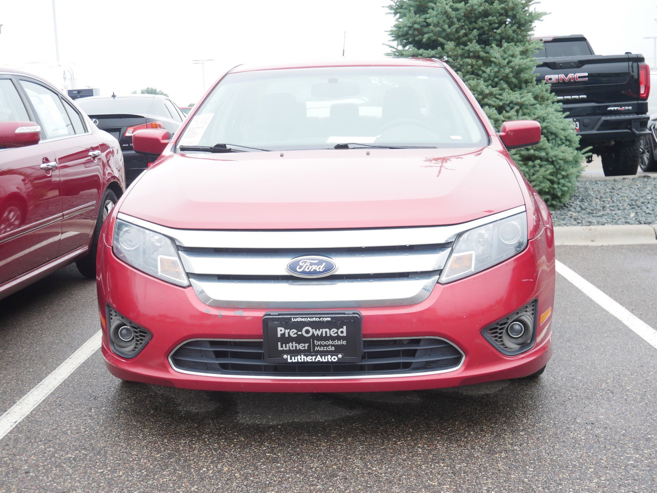 Used 2010 Ford Fusion SE with VIN 3FAHP0HA0AR402863 for sale in Brooklyn Center, Minnesota