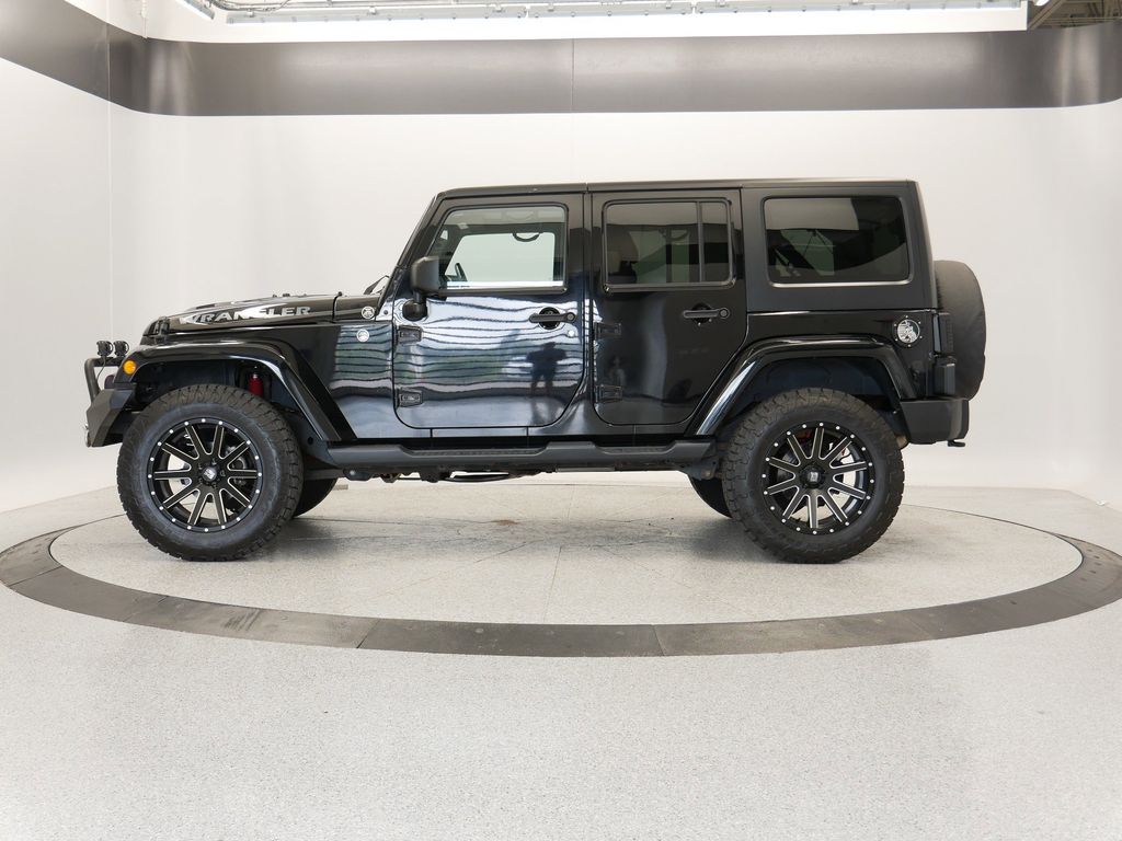 Used 2015 Jeep Wrangler Unlimited Sahara with VIN 1C4BJWEG2FL697967 for sale in Coon Rapids, Minnesota