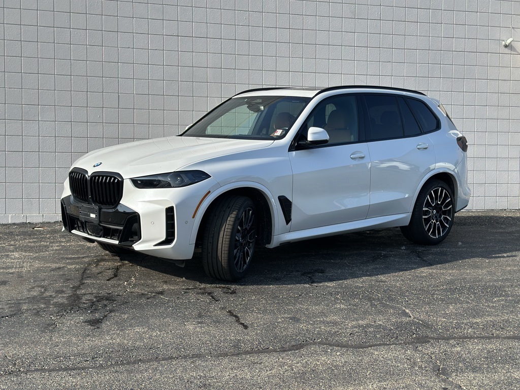 Used 2024 White Metallic BMW xDrive40i image 1