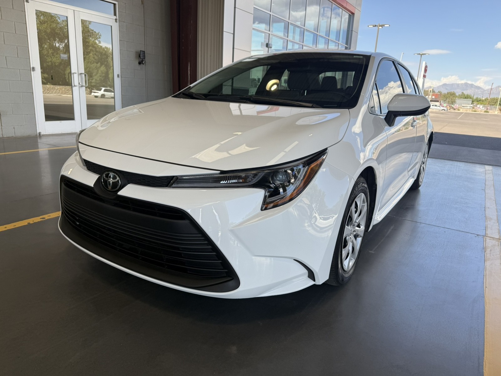Used 2025 WHITE Toyota LE image 1