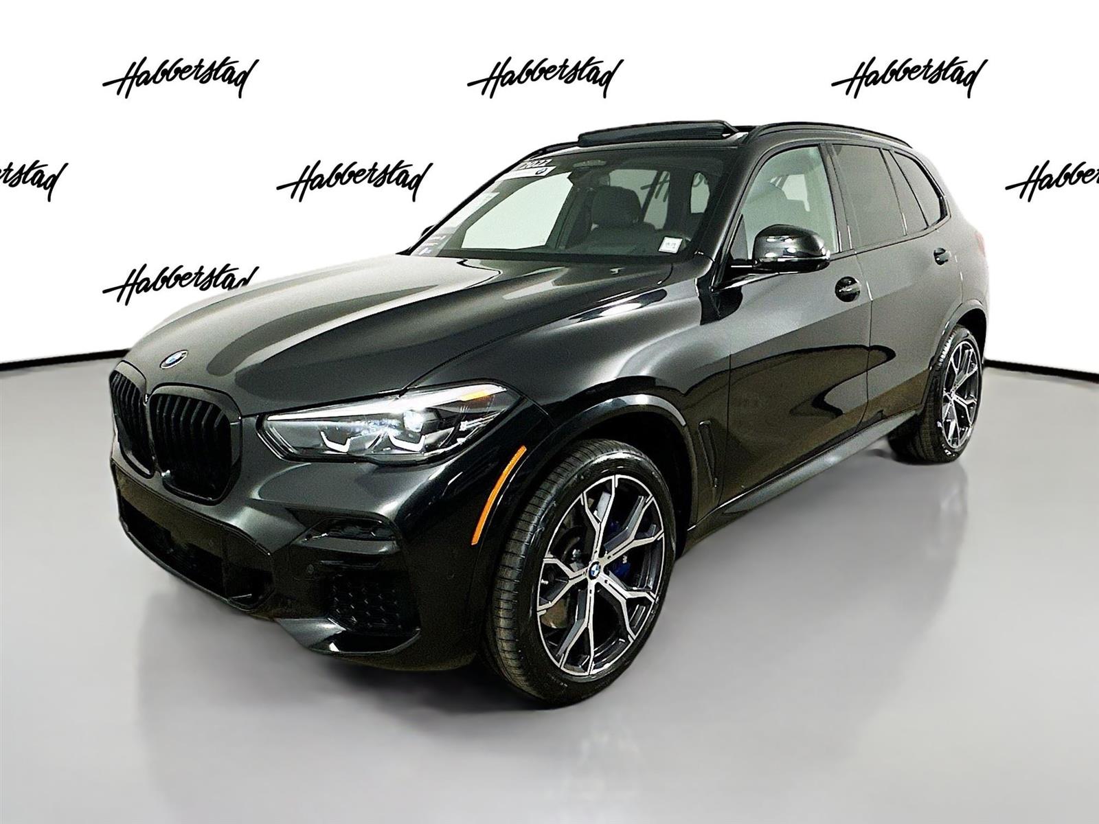 Certified Used 2022 Black Sapphire Metallic BMW M50i image 1