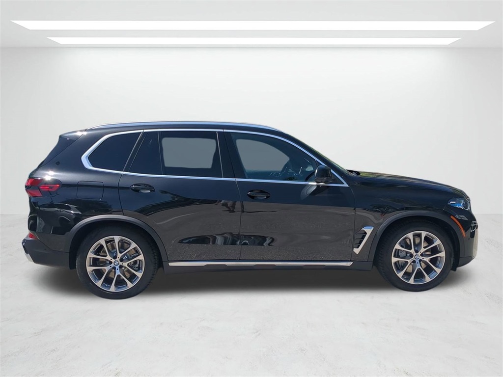 New 2026 Black Sapphire Metallic BMW xDrive50e image 3