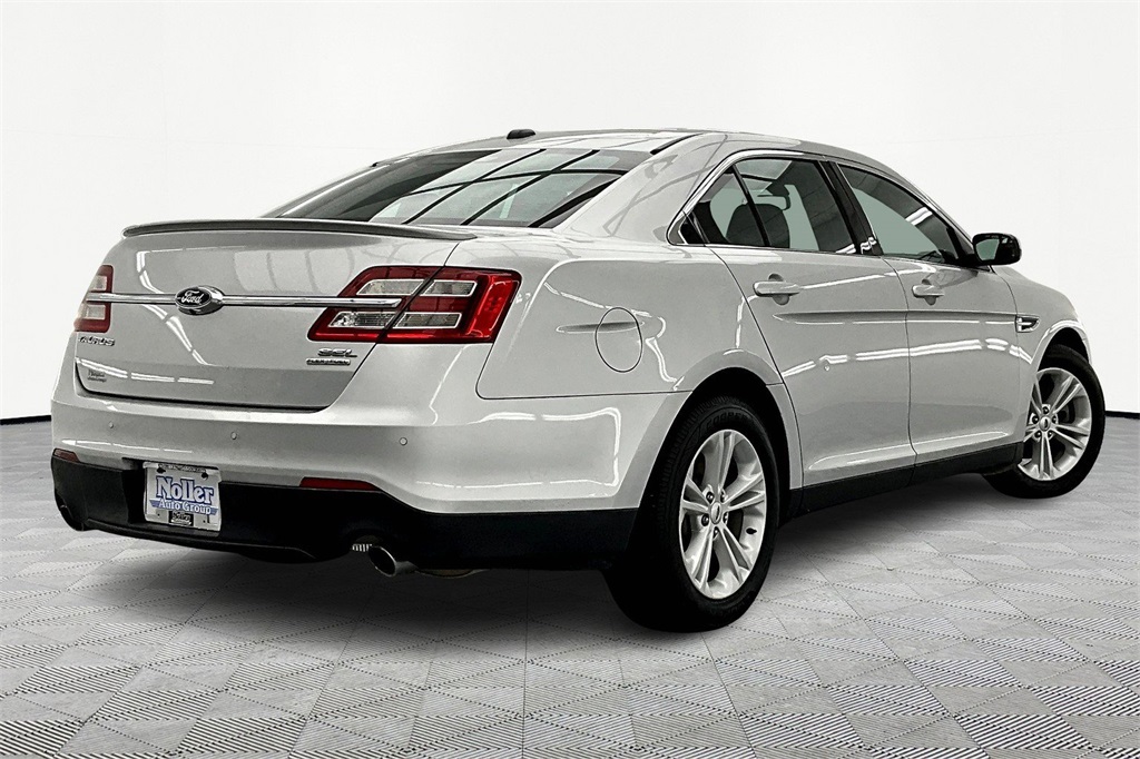 Used 2015 Ford Taurus SEL with VIN 1FAHP2E87FG190037 for sale in Topeka, KS