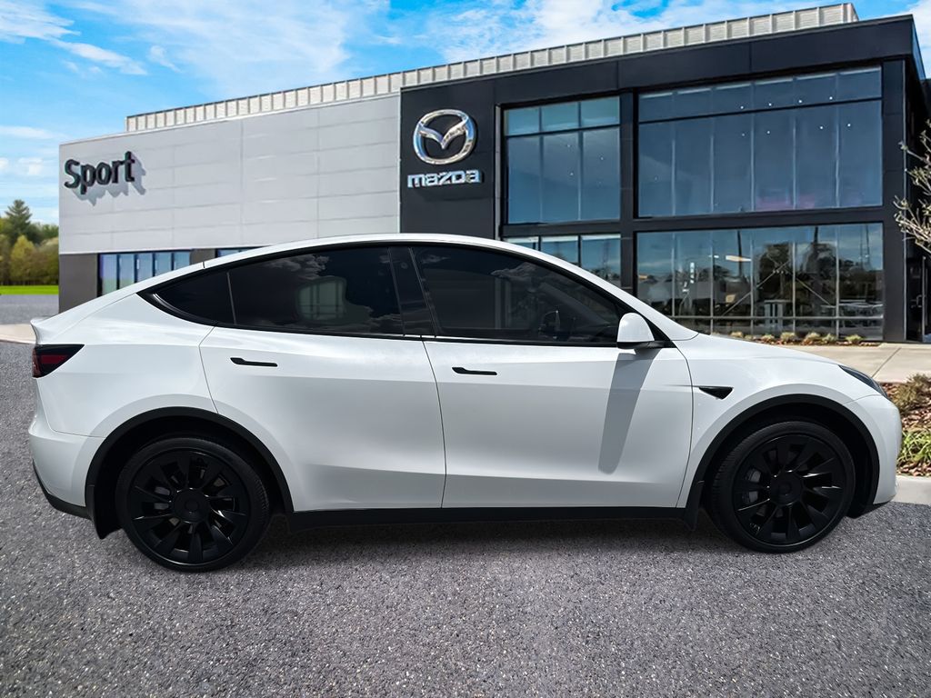 Used 2023 Tesla Model Y Long Range with VIN 7SAYGDEEXPA070661 for sale in Kansas City